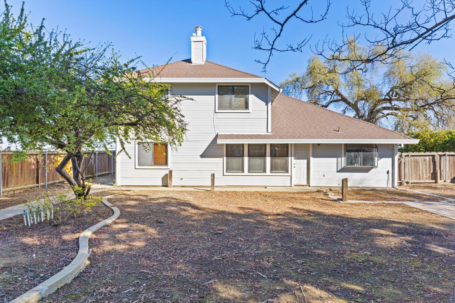8711 Fruchtenicht Road Knights Landing, CA 95645 - Photo 38 of 44 a front view of a house with a yard
