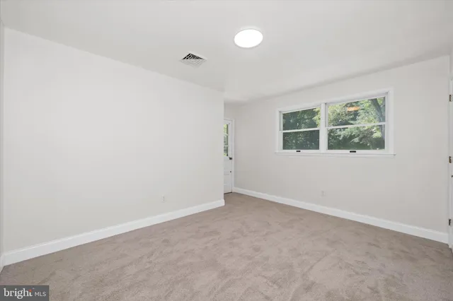 a view of a livingroom with a large window