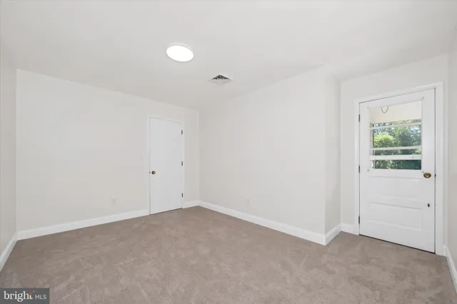 a view of a livingroom with furniture