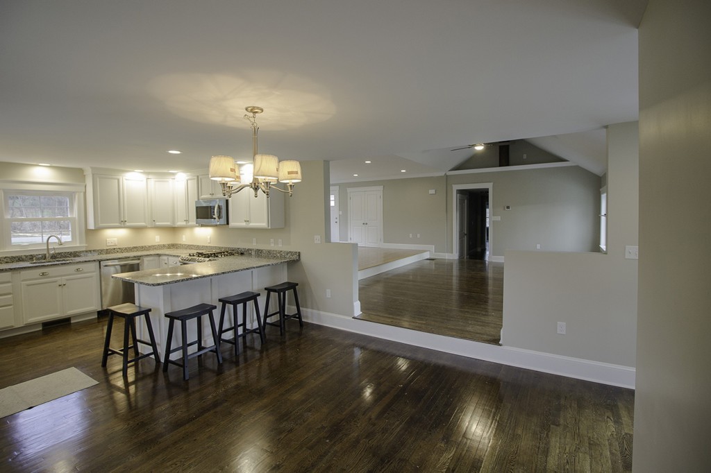 55 Argilla Road Ipswich, MA 01938 - Photo 25 of 26 a kitchen with a table and chairs in it