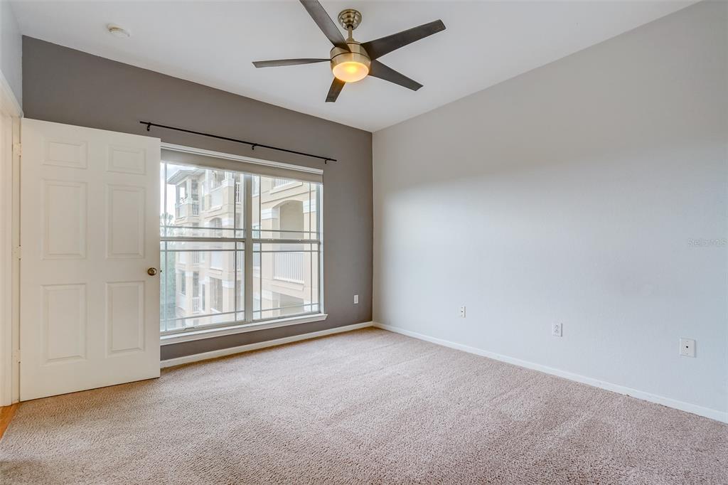 1216 South Missouri Avenue, Unit 311 Clearwater, FL 33756 - Photo 13 of 32 a view of empty room with ceiling fan