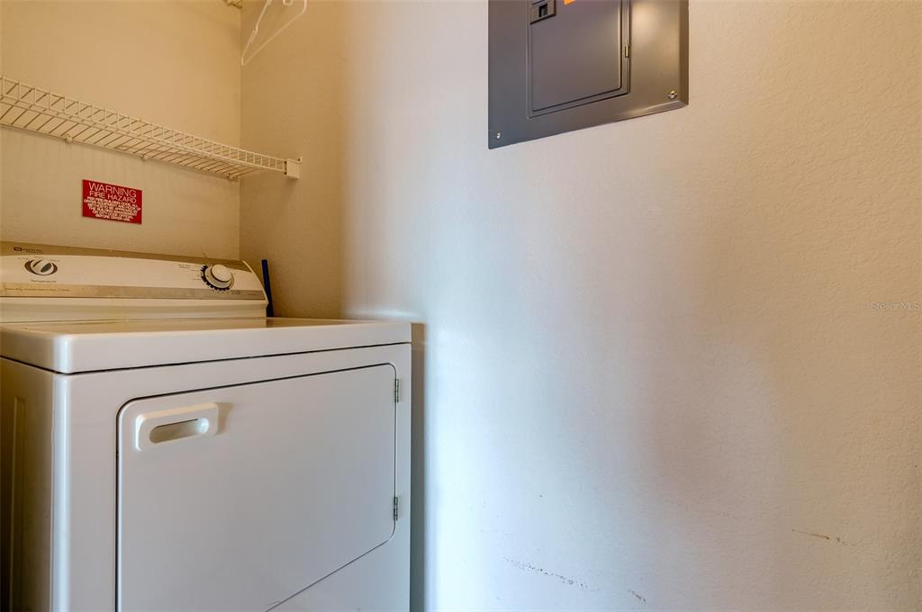 1216 South Missouri Avenue, Unit 311 Clearwater, FL 33756 - Photo 25 of 32 a utility room with dryer and washer