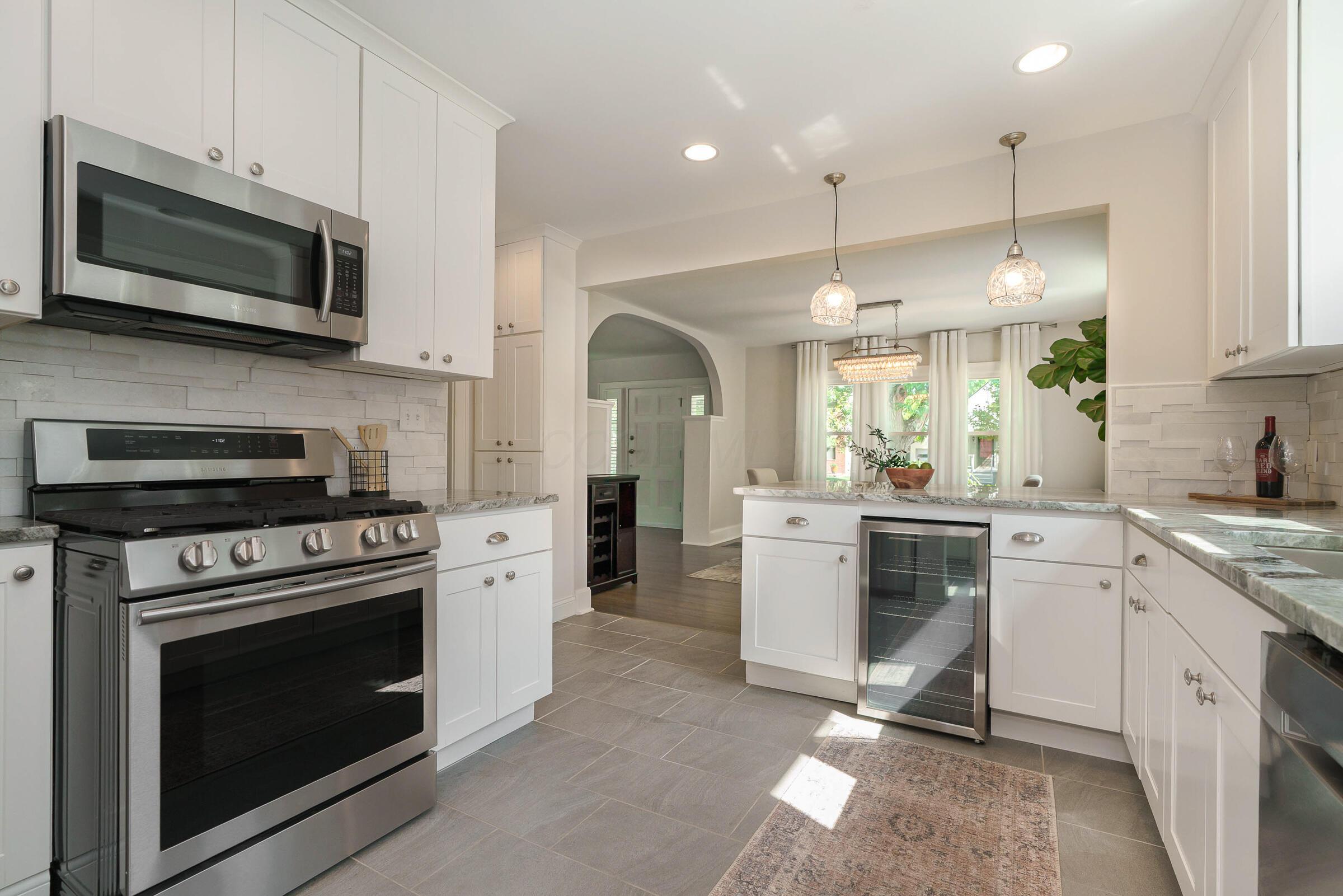 163 Garden Road Columbus, OH 43214 - Photo 18 of 46 Entertain easy in this thoughtfully updated and well planned modern kitchen.