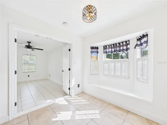a view of an entryway with a kitchen