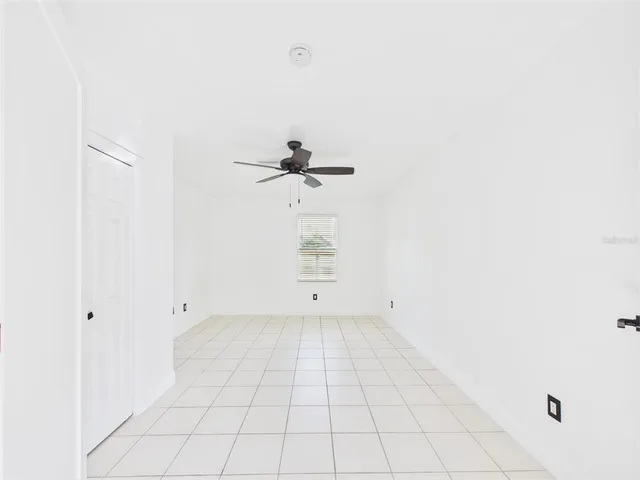 a view of a room with white walls