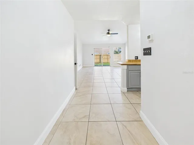 a view of kitchen with furniture and window