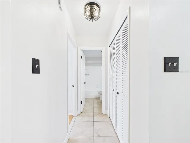 a view of a hallway with entryway