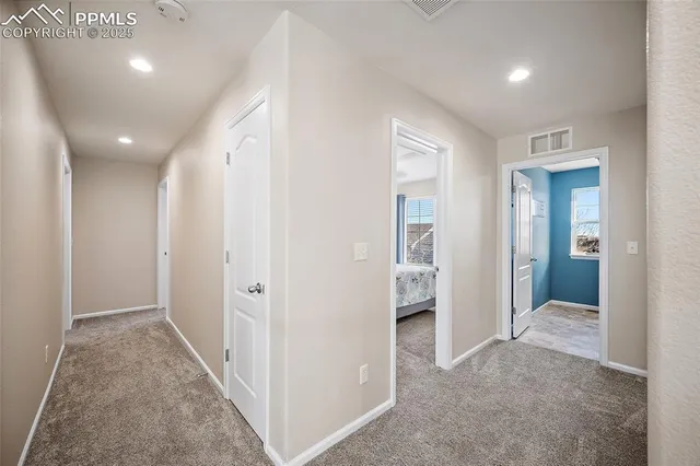 a kitchen with a sink cabinets and window
