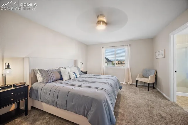 a bathroom with a sink vanity granite tub and a mirror