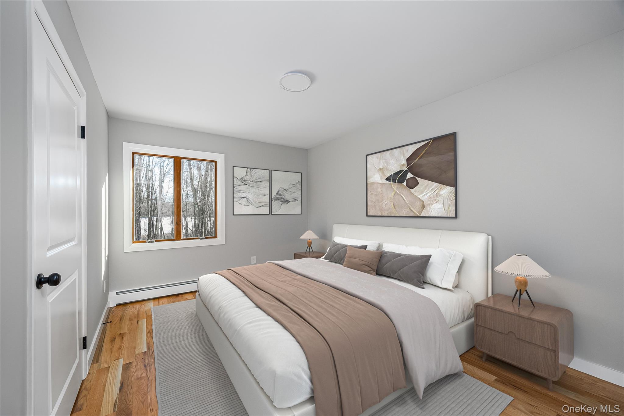 261 Freedom Road Pleasant Valley, NY 12569 - Photo 24 of 50 Bedroom featuring light wood finished floors and a baseboard radiator