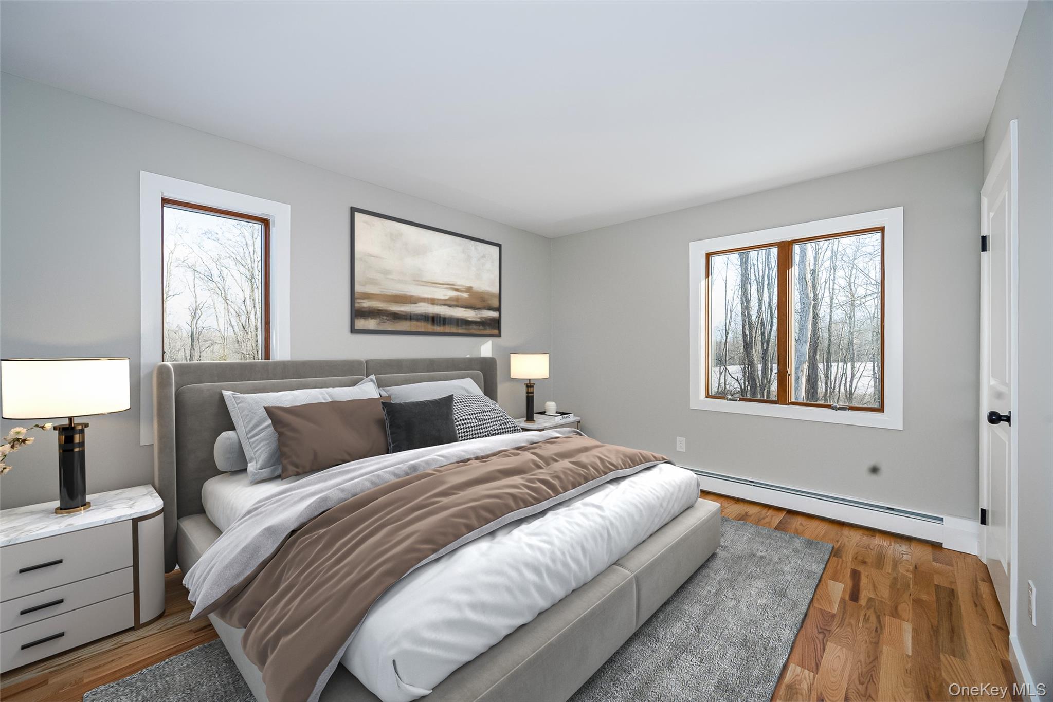 261 Freedom Road Pleasant Valley, NY 12569 - Photo 25 of 50 Bedroom with a baseboard heating unit, wood finished floors, and multiple windows