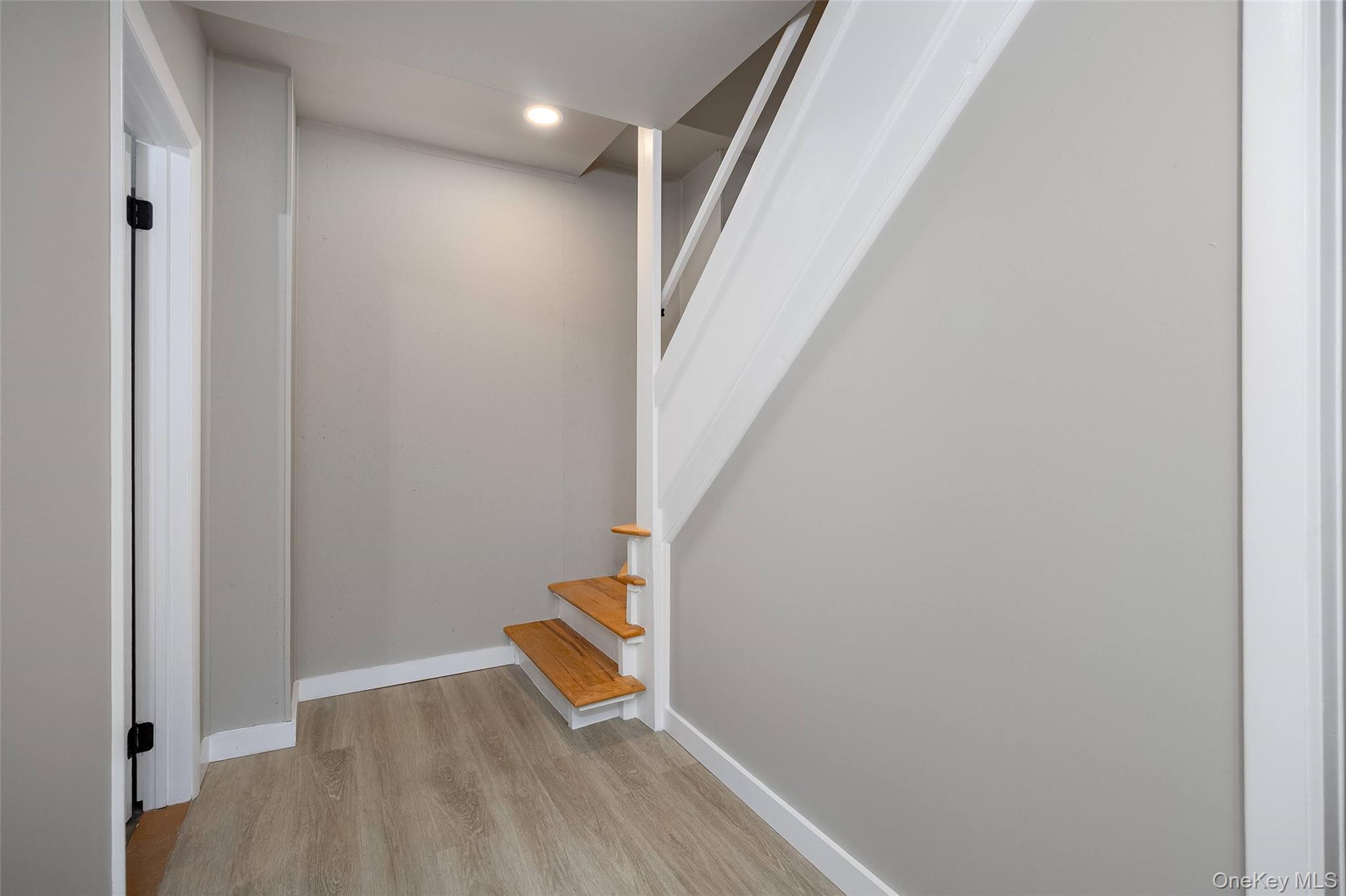 261 Freedom Road Pleasant Valley, NY 12569 - Photo 29 of 50 Stairway featuring wood finished floors and recessed lighting