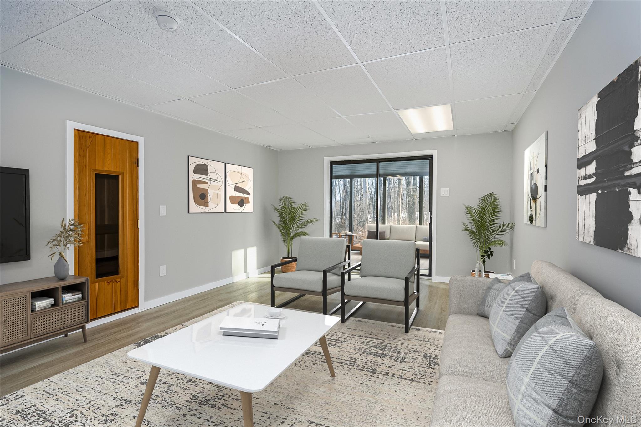 261 Freedom Road Pleasant Valley, NY 12569 - Photo 33 of 50 Living area with a drop ceiling and wood finished floors