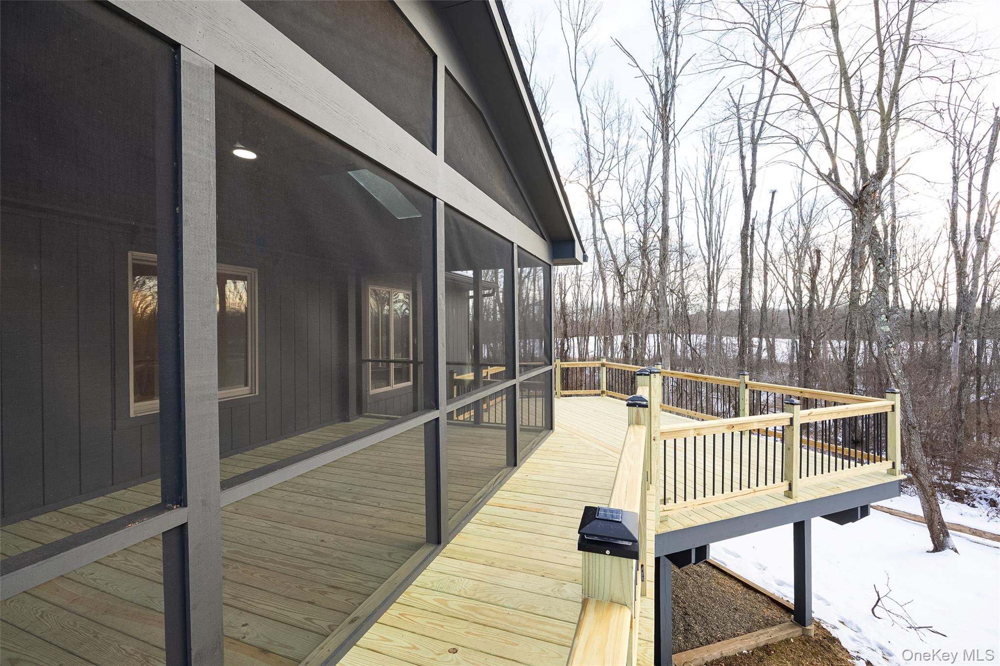 261 Freedom Road Pleasant Valley, NY 12569 - Photo 37 of 50 Wooden terrace featuring a sunroom