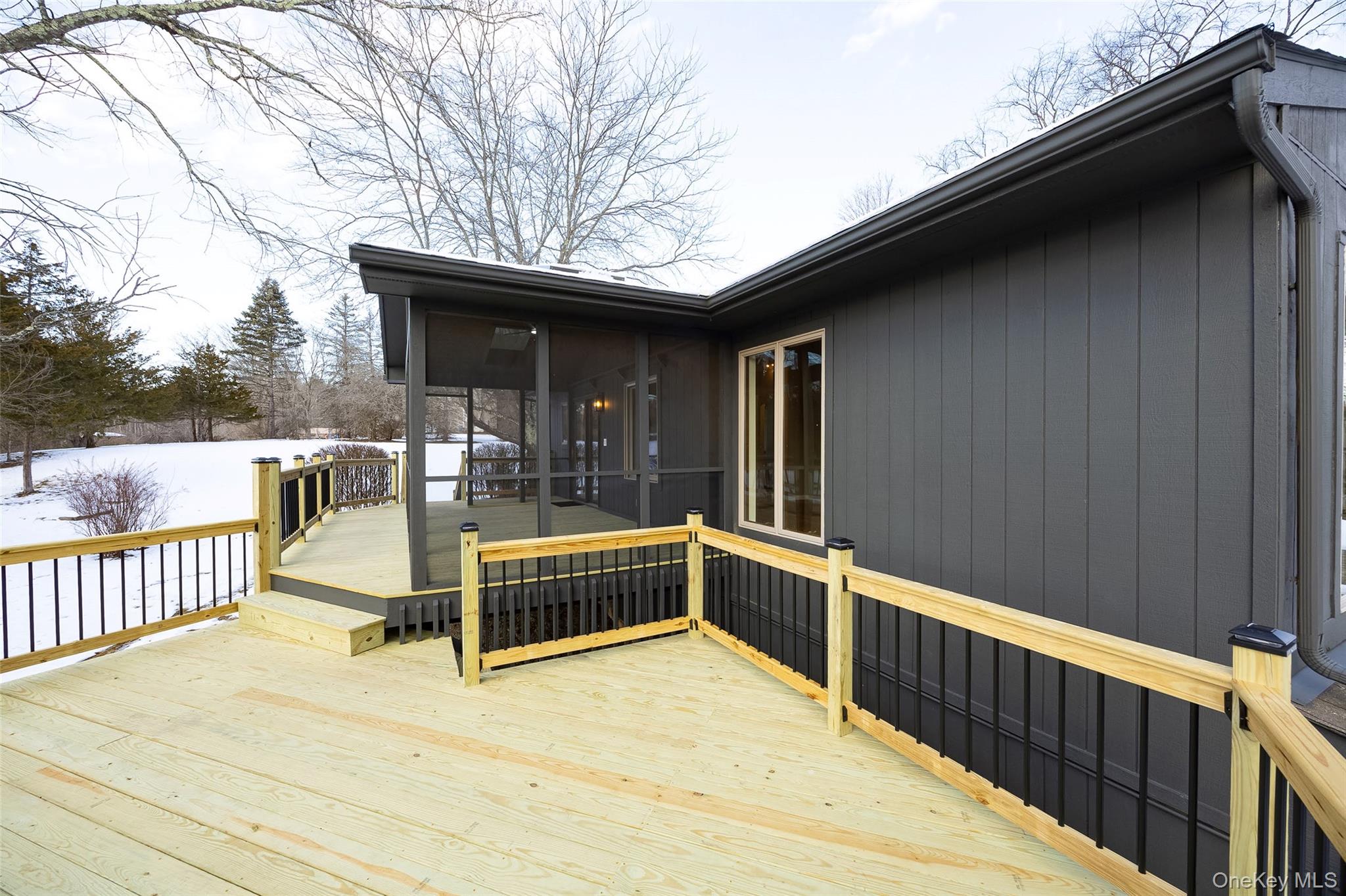 261 Freedom Road Pleasant Valley, NY 12569 - Photo 38 of 50 Deck featuring a sunroom