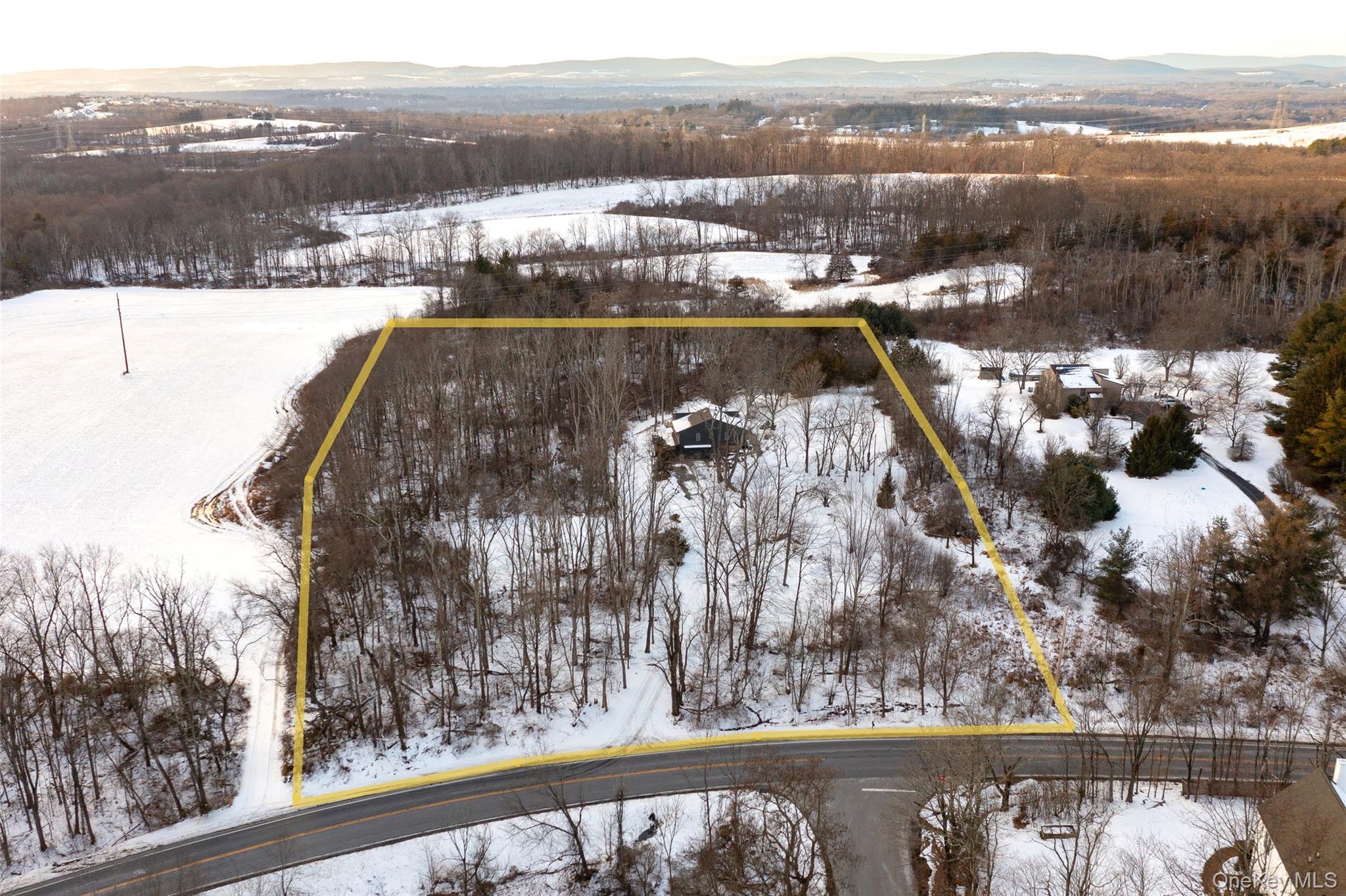 261 Freedom Road Pleasant Valley, NY 12569 - Photo 44 of 50 Snowy aerial view featuring a mountain view and property parcel outlined