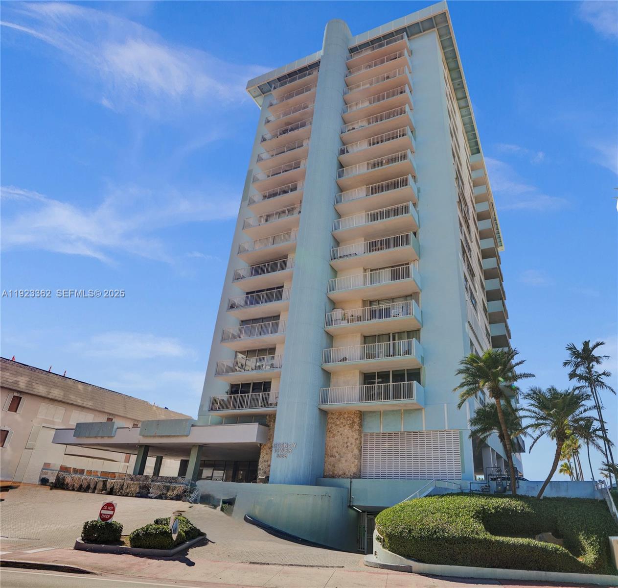 5838 Collins Avenue, Unit 8B Miami Beach, FL 33140 - Photo 2 of 30 a front view of a multi story building