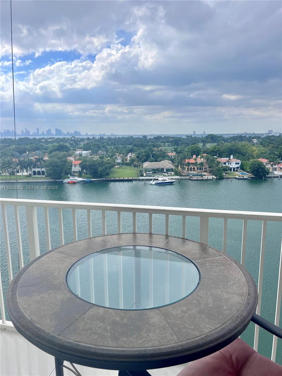 5838 Collins Avenue, Unit 8B Miami Beach, FL 33140 - Photo 22 of 30 a view of a balcony with city view