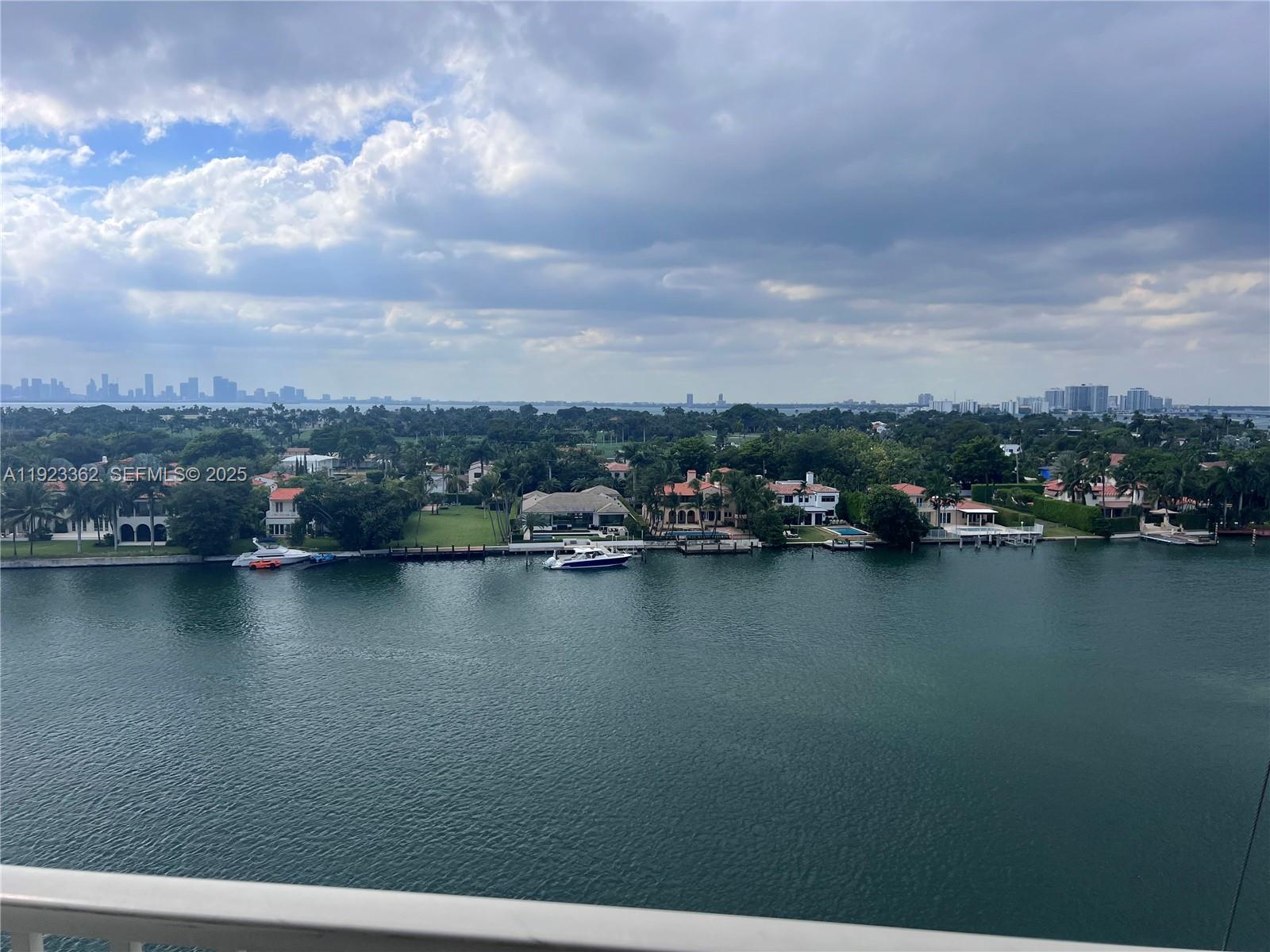 5838 Collins Avenue, Unit 8B Miami Beach, FL 33140 - Photo 24 of 30 an aerial view of city and lake