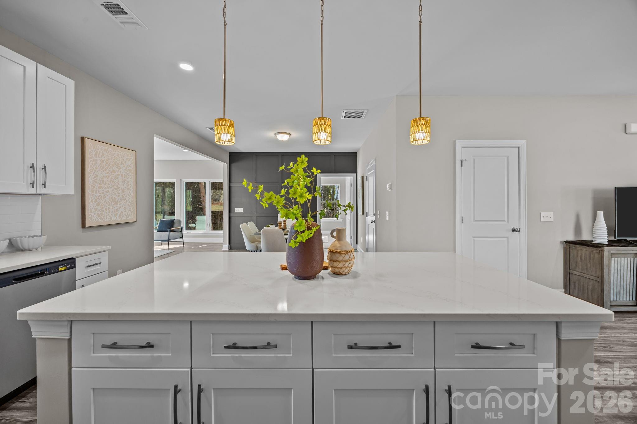 1813 Shuford Road Lincolnton, NC 28092 - Photo 17 of 47 a kitchen with a sink a counter space appliances and cabinets