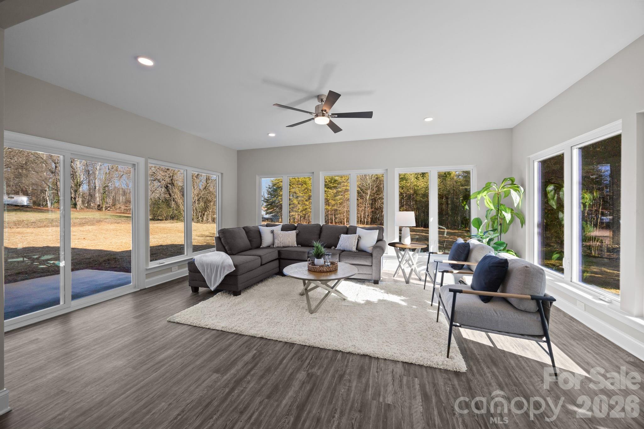 1813 Shuford Road Lincolnton, NC 28092 - Photo 21 of 47 a living room with furniture and a large window