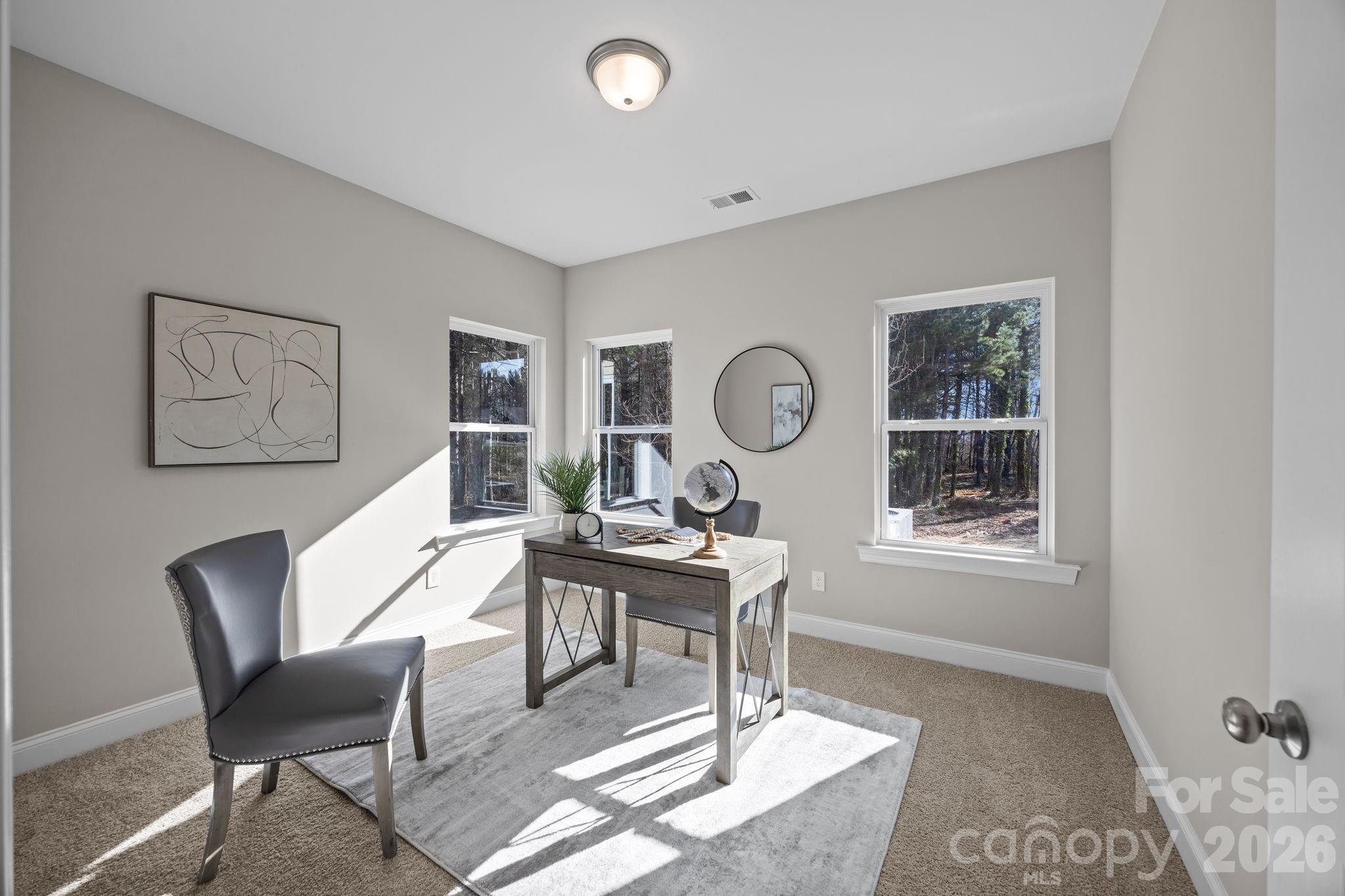 1813 Shuford Road Lincolnton, NC 28092 - Photo 22 of 47 a view of a workspace with furniture and a window