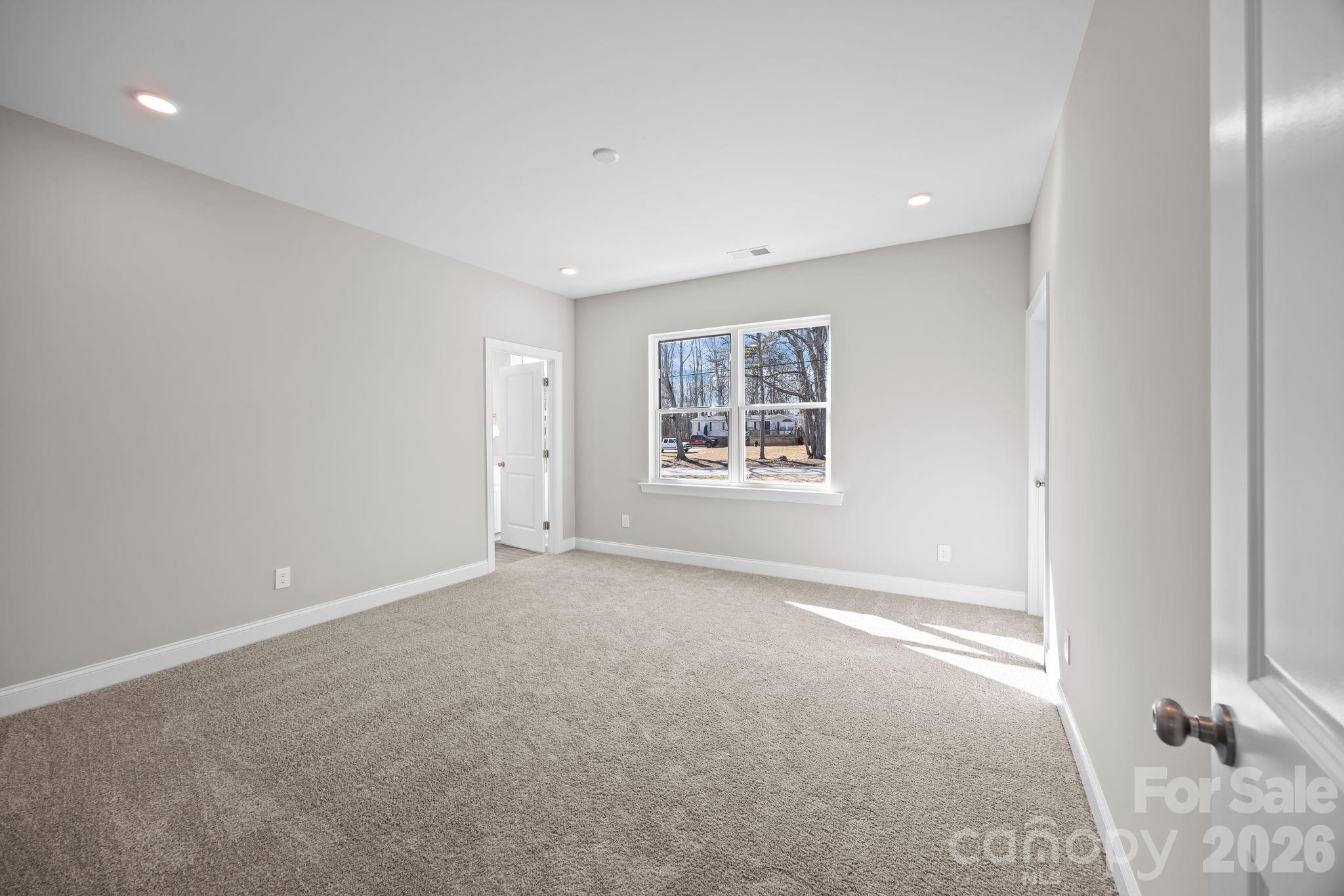 1813 Shuford Road Lincolnton, NC 28092 - Photo 23 of 47 an empty room with windows