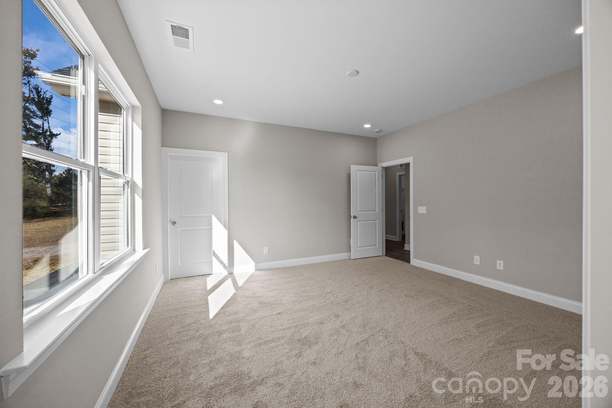 1813 Shuford Road Lincolnton, NC 28092 - Photo 24 of 47 a view of an empty room with glass door