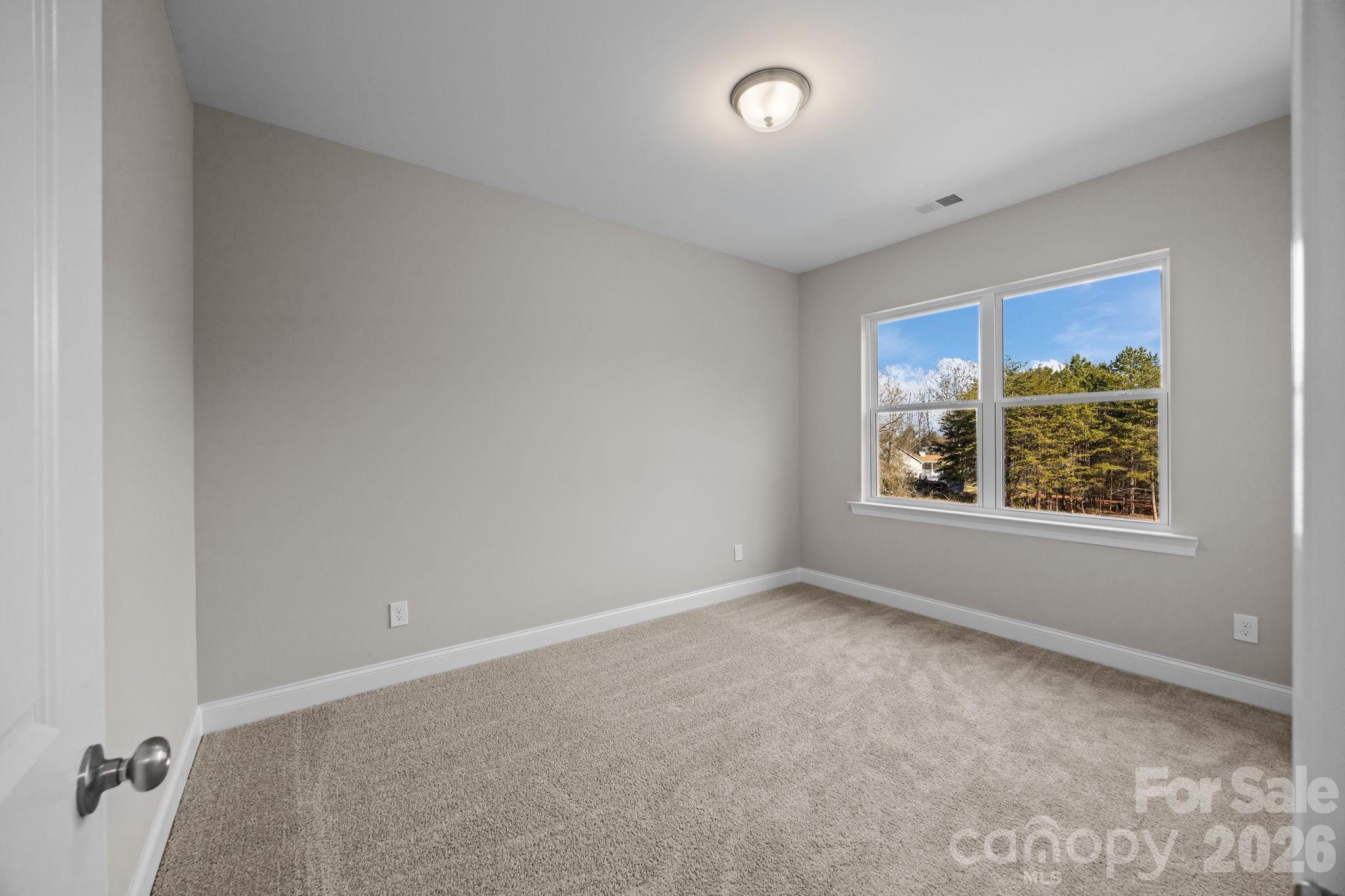 1813 Shuford Road Lincolnton, NC 28092 - Photo 29 of 47 an empty room with windows