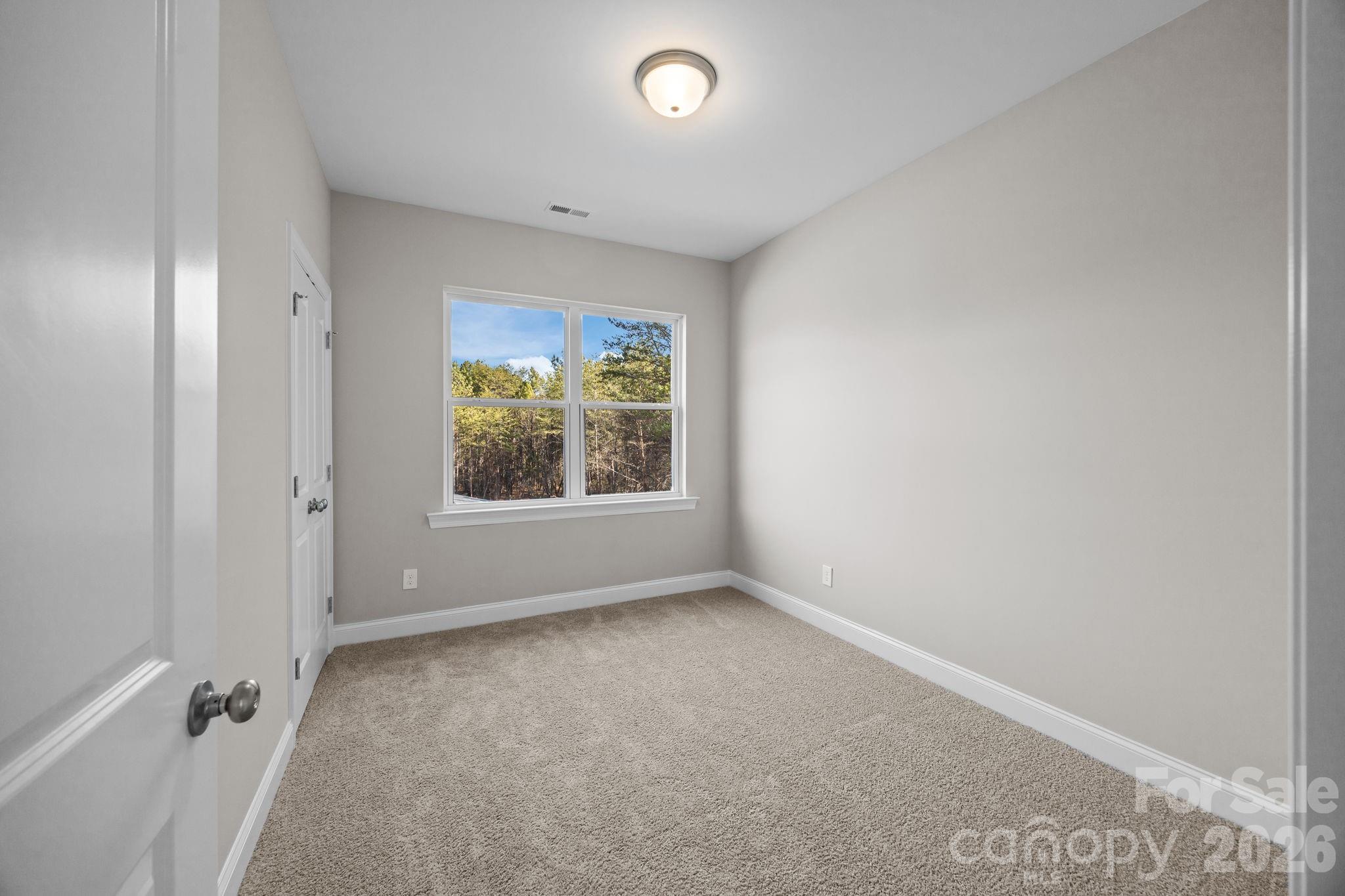 1813 Shuford Road Lincolnton, NC 28092 - Photo 30 of 47 an empty room with windows