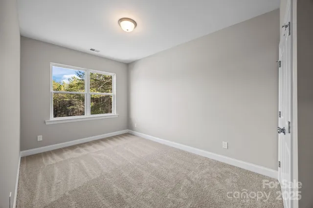 a bathroom with a double vanity sink toilet and shower