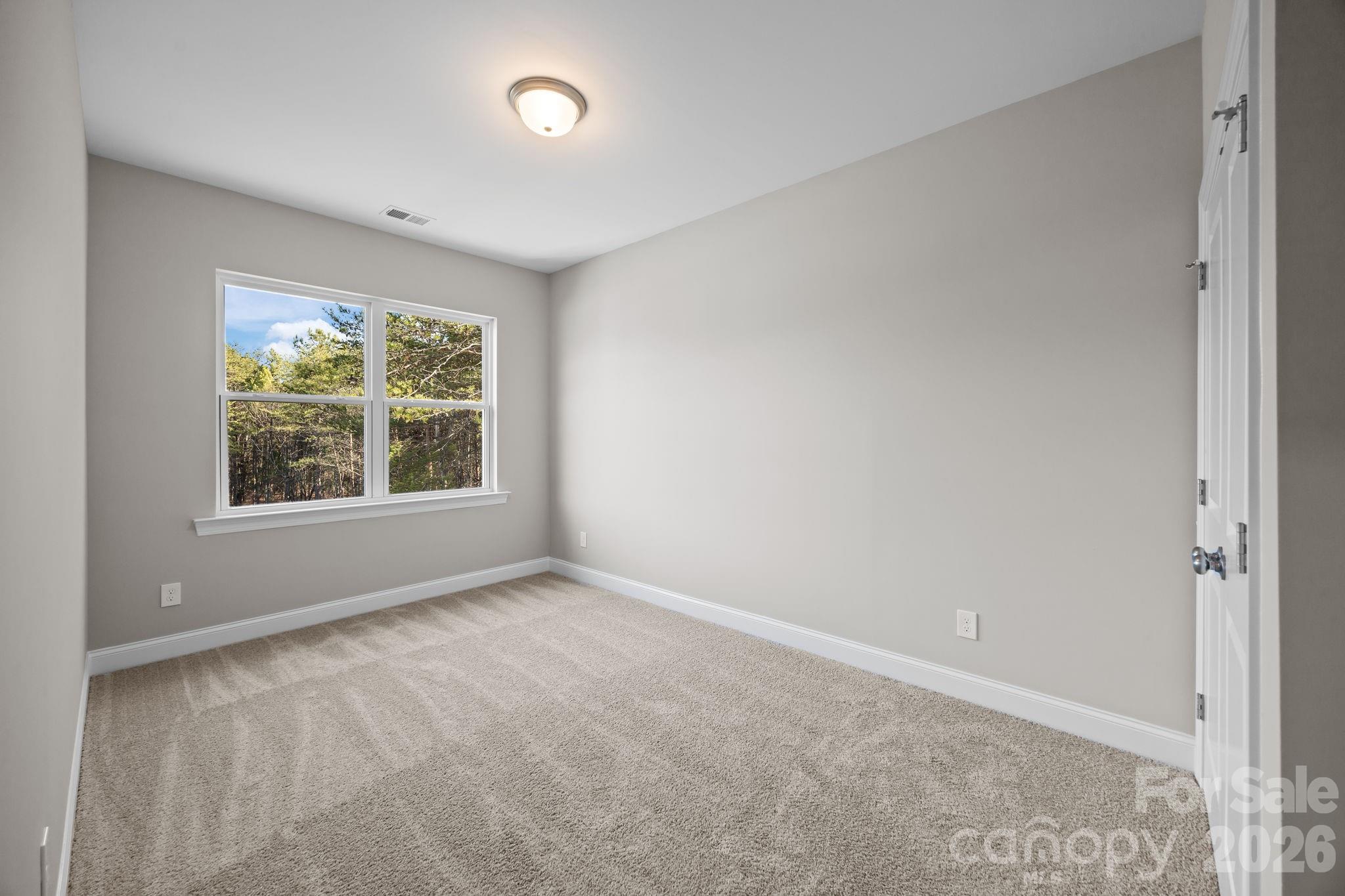 1813 Shuford Road Lincolnton, NC 28092 - Photo 31 of 47 an empty room with windows