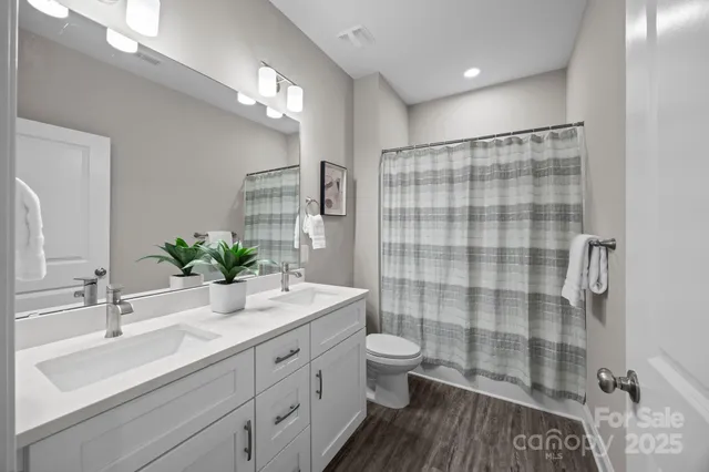 a view of a storage & utility room with racks on the wall