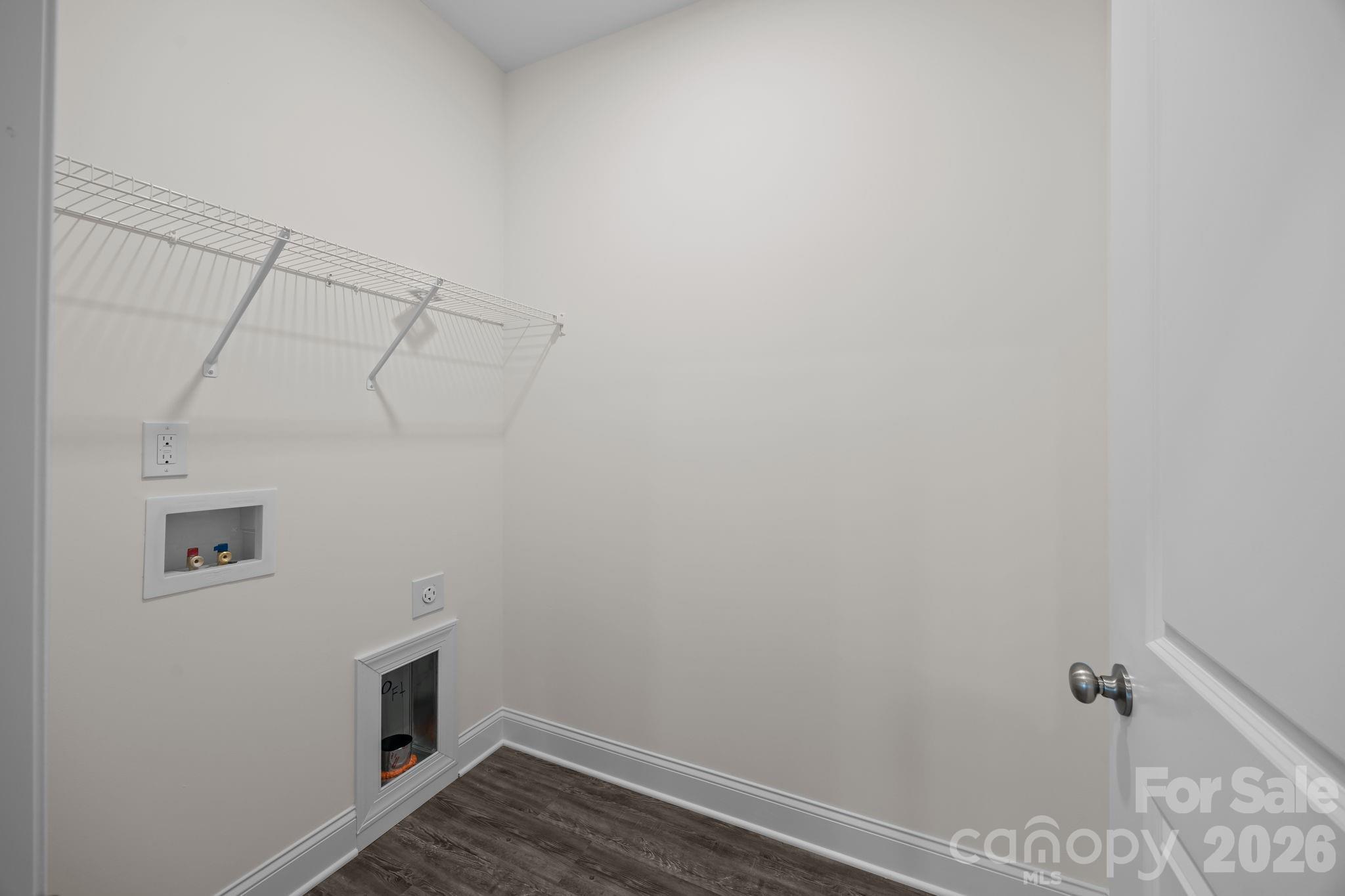 1813 Shuford Road Lincolnton, NC 28092 - Photo 33 of 47 a view of a storage & utility room with racks on the wall