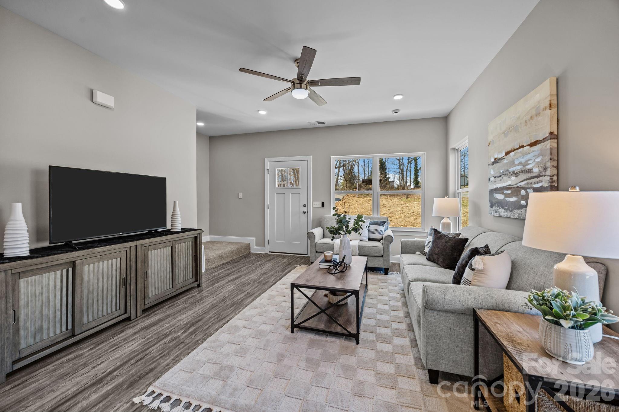 1813 Shuford Road Lincolnton, NC 28092 - Photo 9 of 47 a living room with furniture and a flat screen tv