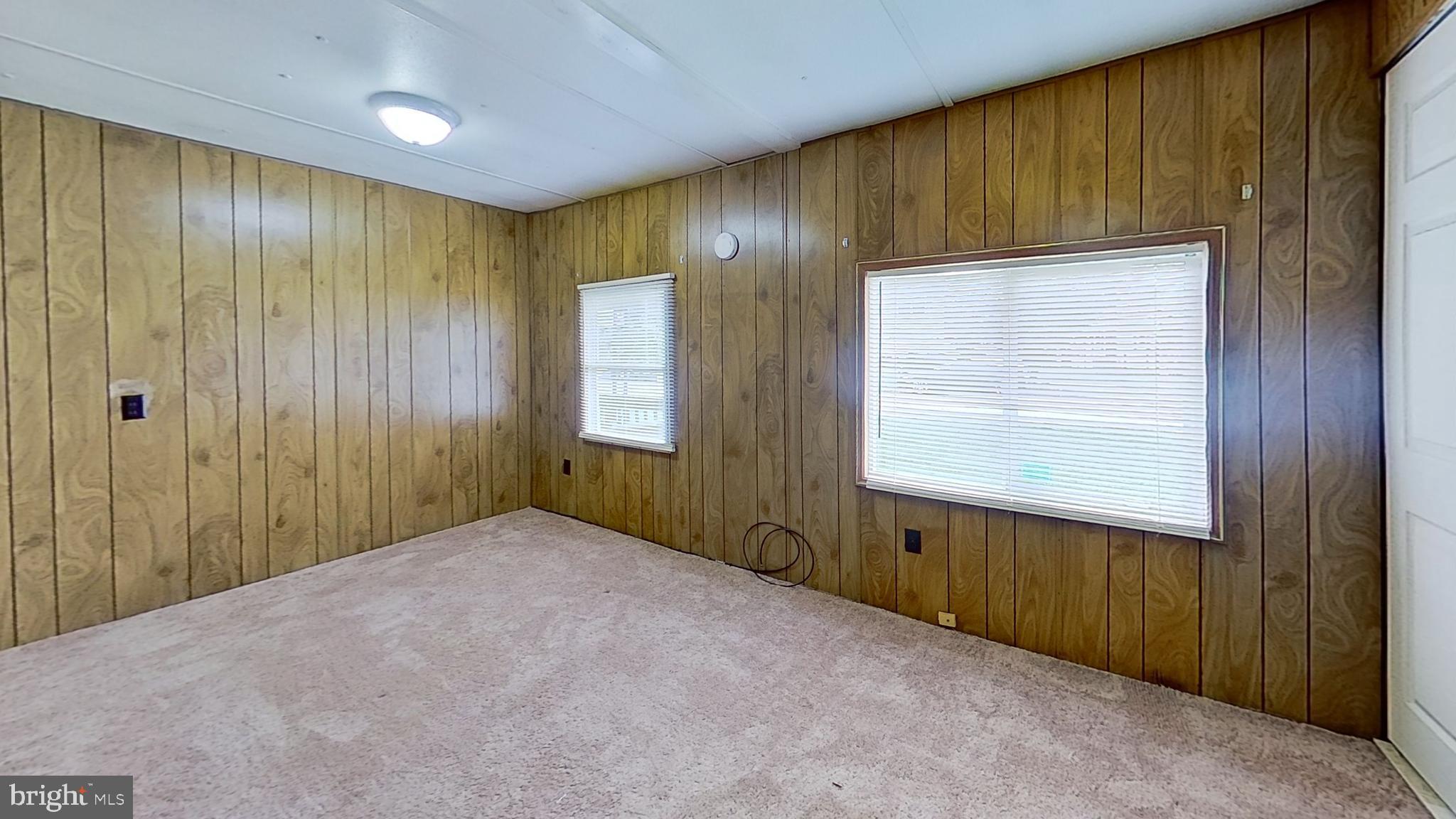 3230 Oakland Road, Unit 1 Dover, PA 17315 - Photo 2 of 5 a view of an empty room and window
