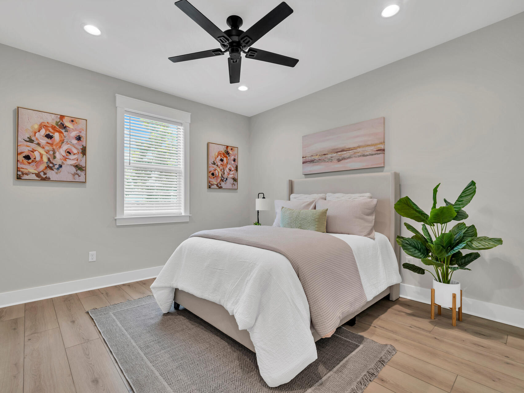 140 Sibert Avenue, Unit 11 Destin, FL 32541 - Photo 18 of 38 a bedroom with a large bed and a potted plant