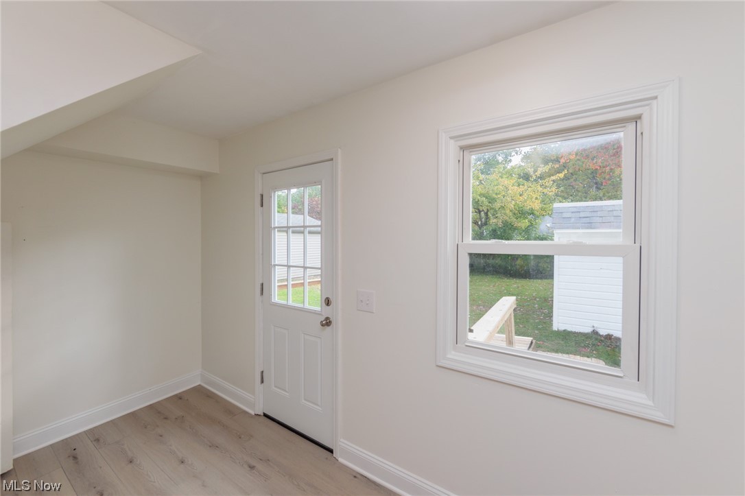 355 Dellwood Road Avon Lake, OH 44012 - Photo 31 of 35 Doorway to outside featuring light hardwood flooring