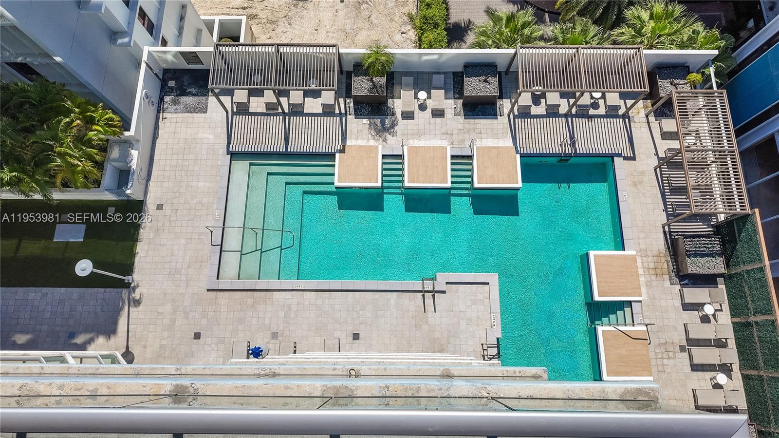 1010 Southwest 2nd Avenue, Unit 1209 Miami, FL 33130 - Photo 11 of 11 a view of a brick house with a yard