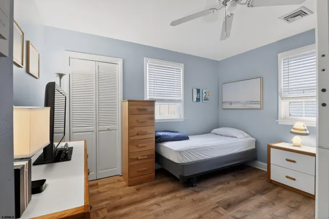 a room with furniture and a flat screen tv