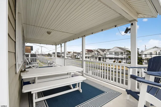 a balcony with furniture