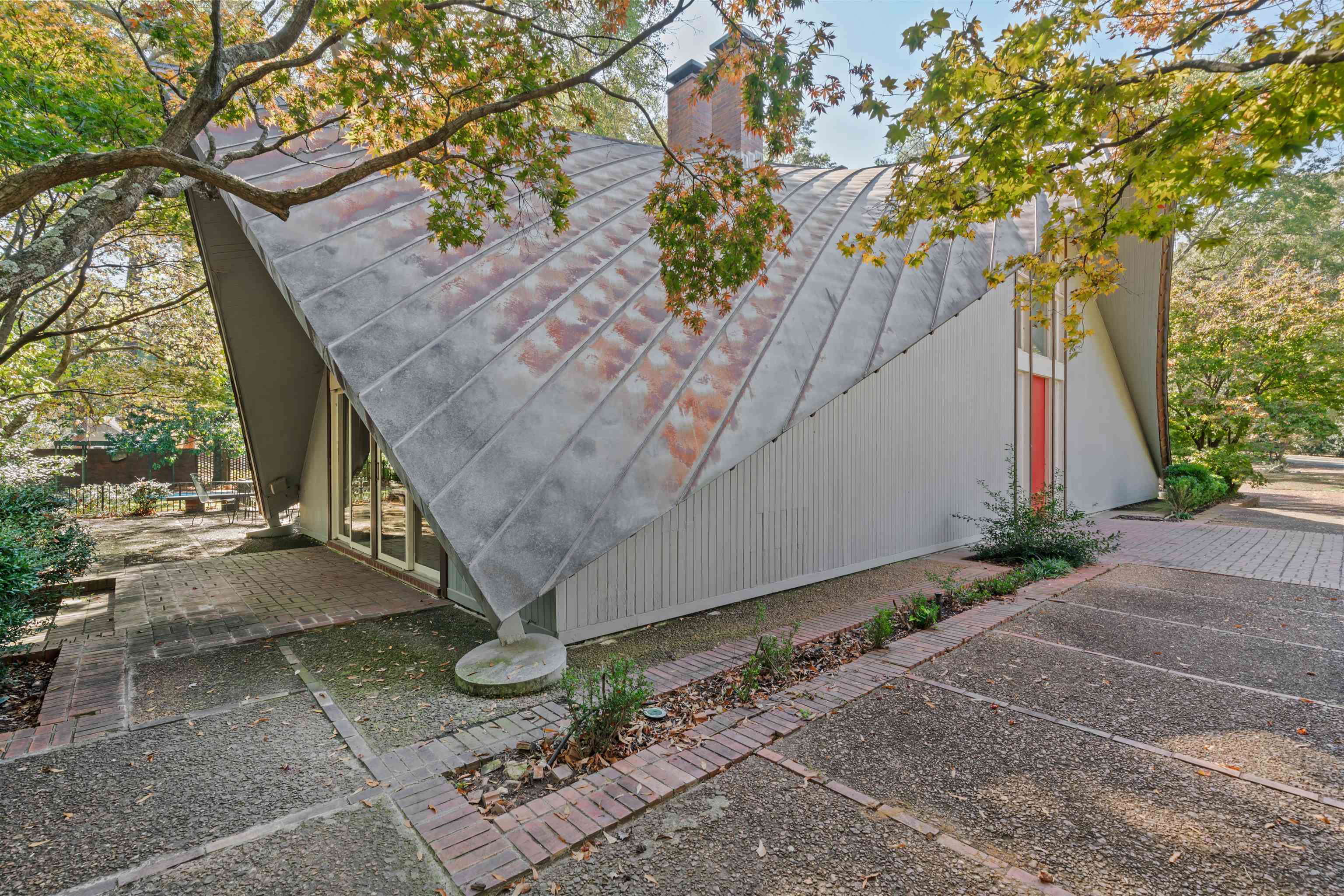 150 Waring Road Memphis, TN 38117 - Photo 38 of 40 The oxidation on the metal roof (the reddish color in some areas) is of the protective coating only. The underlying stainless steel is not structurally affected.
