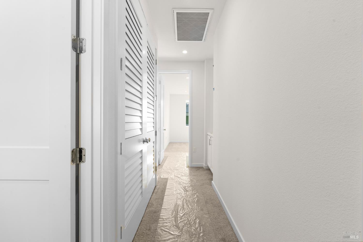 1448 Waterside Lane Rohnert Park, CA 94928 - Photo 32 of 35 a view of a hallway with a white walls