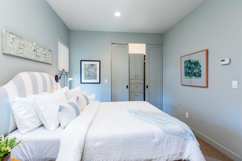 209 Fanmar Way Capitola, CA 95010 - Photo 12 of 31 a bedroom with a bed and a couch