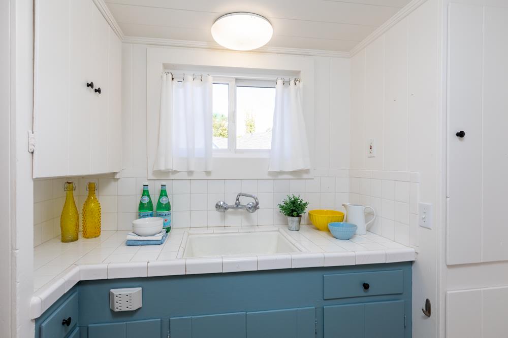 209 Fanmar Way Capitola, CA 95010 - Photo 19 of 31 a bathroom with a sink and a mirror