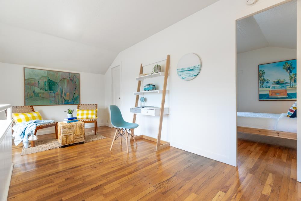 209 Fanmar Way Capitola, CA 95010 - Photo 22 of 31 a living room with furniture and a wooden floor