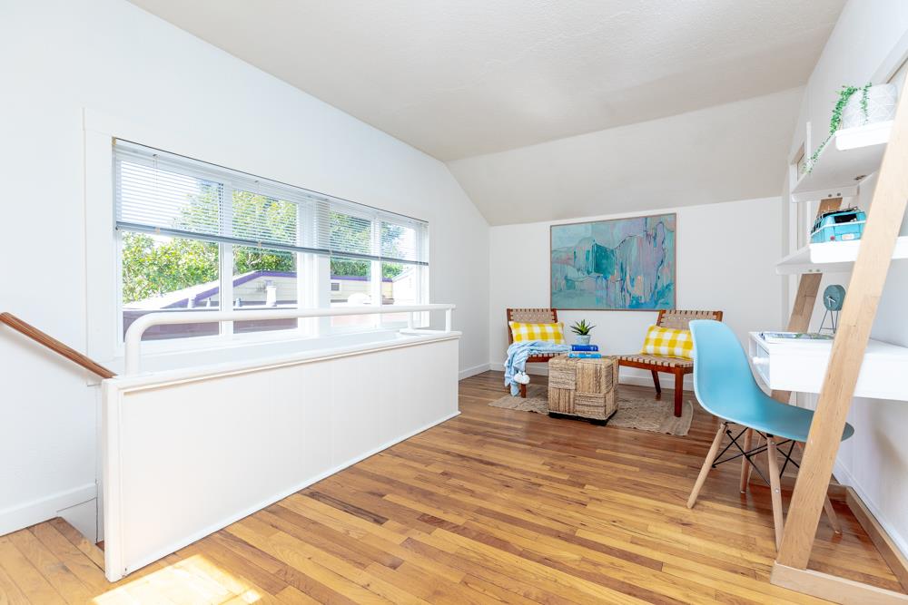 209 Fanmar Way Capitola, CA 95010 - Photo 23 of 31 a living room with furniture and a large window