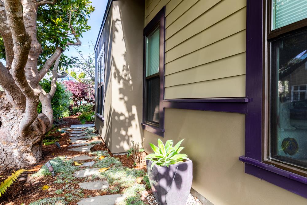 209 Fanmar Way Capitola, CA 95010 - Photo 27 of 31 a vase of flowers sitting on a floor