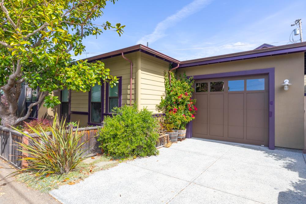 209 Fanmar Way Capitola, CA 95010 - Photo 28 of 31 a house with a flower garden in front of it