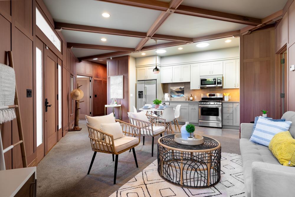209 Fanmar Way Capitola, CA 95010 - Photo 8 of 31 a living room with furniture a rug and kitchen view